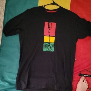 Black Tee with Microphone and Roots Graphic